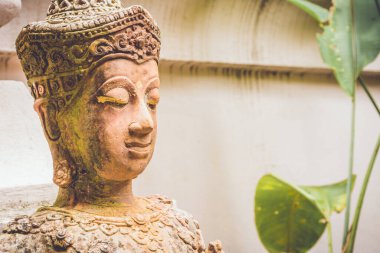 ancient buddha sculpture in the temple ,Chiang Mai Thailand .