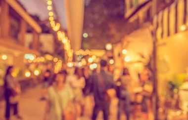 Görüntü için arka plan kullanım sokak festivali yürüyüş gıda durak bulanıklık. (vintage sesi)