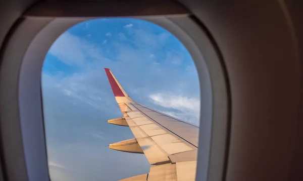 View from airplane window to see sky on evening time.