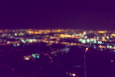Soyut şehir bokeh ışık arkaplanının klasik ton bulanık görüntüsü