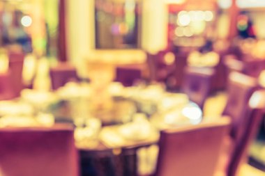 Arka plan kullanımı için bulanık yemek tablosunun klasik ton görüntüsü .