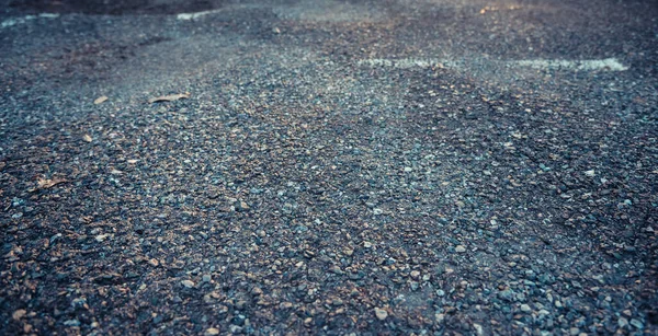 vintage tone image of damaged crack asphalt street day time.