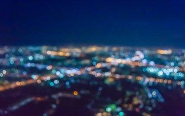 Soyut şehir bokeh ışık arkaplanının klasik ton bulanık görüntüsü