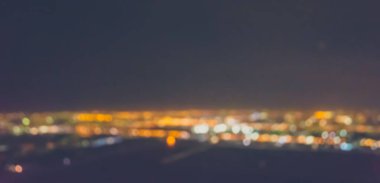 Soyut şehir bokeh ışık arkaplanının klasik ton bulanık görüntüsü