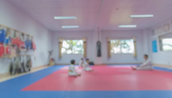 Unschärferelation Der Taekwondo Klasse Mit Lehrer Und Schüler Als Hintergrund — Stockfoto