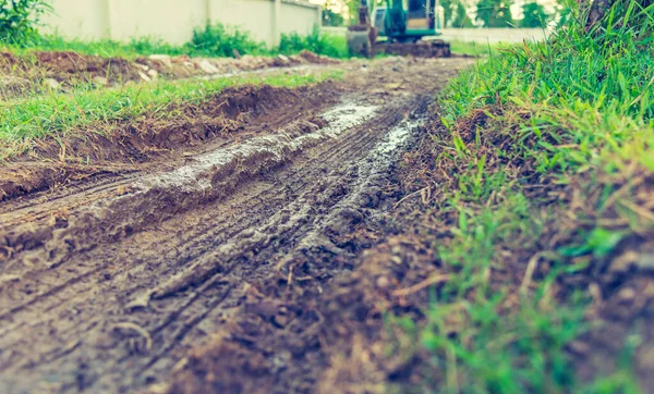 バックホウ車の修理道路のイメージを背景使用のための昼間の時間 ヴィンテージトーン — ストック写真