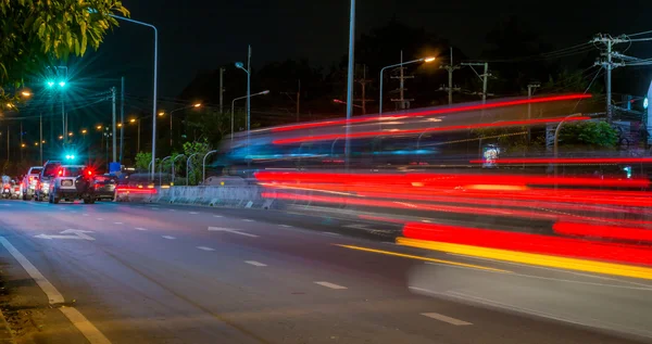 Long exposure photo of light trails on the street — Stock Photo, Image