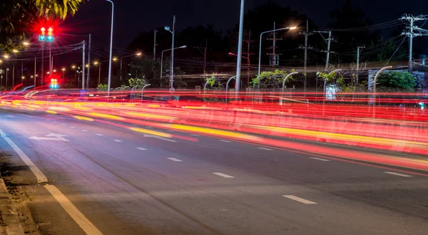 Long exposure photo of light trails on the street — Stock Photo, Image
