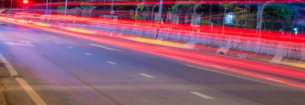 Long exposure photo of light trails on the street — Stock Photo, Image