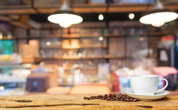 Koffie winkel wazig achtergrond met bokeh — Stockfoto