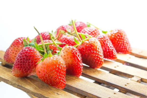 Fresh strawberry on wood table isolated on white background. — Stock Photo, Image