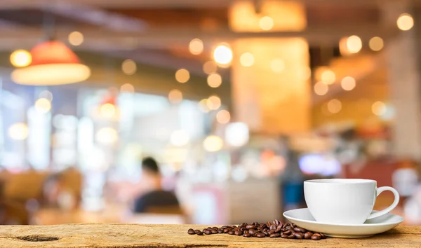 Coffee Shop verschwimmen Hintergrund mit Bokeh-Bild. — Stockfoto