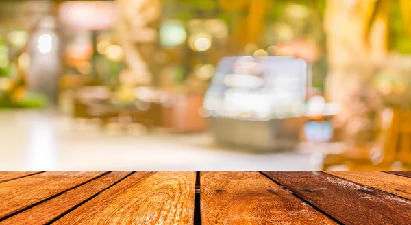 Mesa de madera vacía y fondo borroso Cafetería con imag bokeh —  Fotos de Stock