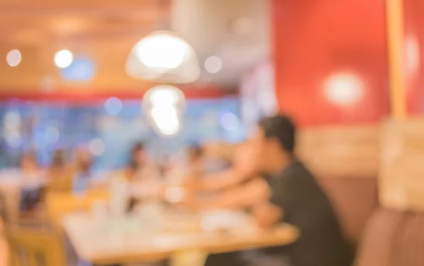 Coffee Shop verschwimmen Hintergrund mit Bokeh-Bild. — Stockfoto