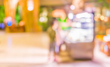 Bokeh imajı olan bir kafenin arka planı bulanık .