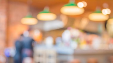 Bokeh imajı olan bir kafenin arka planı bulanık .