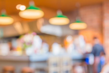 Bokeh imajı olan bir kafenin arka planı bulanık.