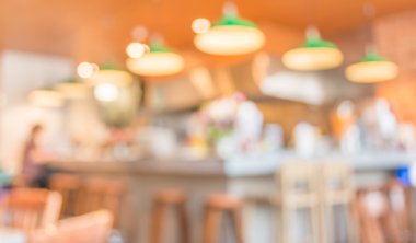 Bokeh imajı olan bir kafenin arka planı bulanık.