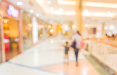 Alışveriş merkezinin bulanık görüntüsü ve arka plan kullanımı için insanlar.