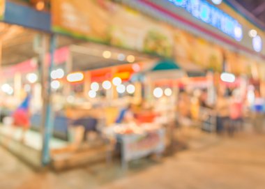 bulanık görüntü gece Pazarı'na ve insanlar için arka plan kullanım.
