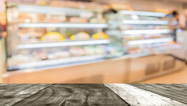 Pastane dükkanı için arka plan kullanım insanlarda görüntü bulanıklığı