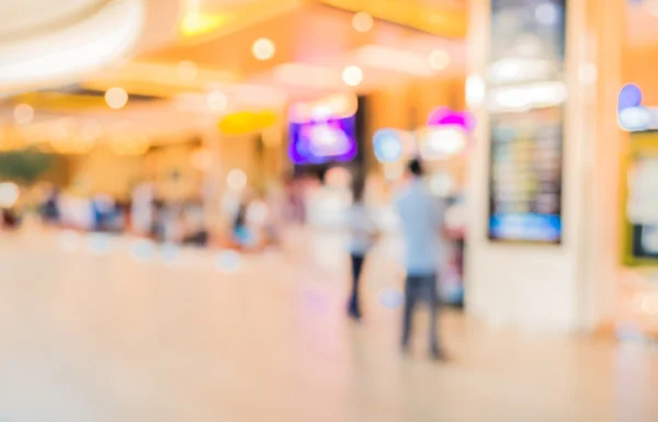 Imagem turva de shopping center e pessoas . — Fotografia de Stock