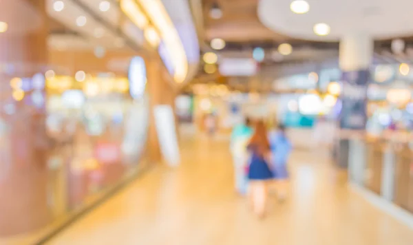 Blurred image of shopping mall and people — Stock Photo, Image