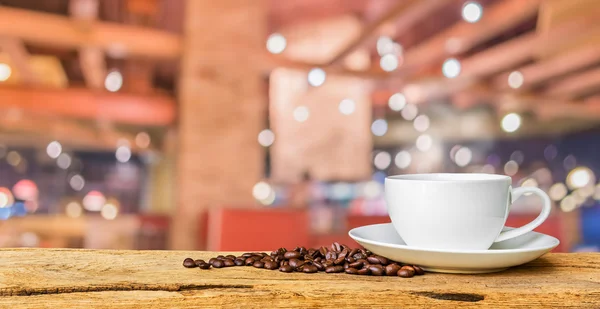 Coffee Shop verschwimmen Hintergrund mit Bokeh-Bild. — Stockfoto