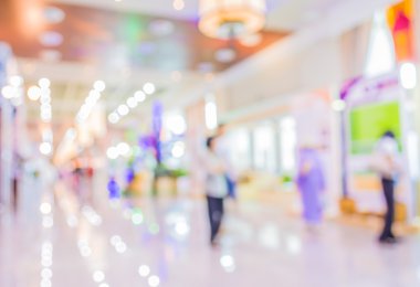 Alışveriş merkezinin bulanık görüntüsü ve arka plan kullanımı için insanlar .