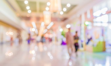 Alışveriş merkezinin bulanık görüntüsü ve arka plan kullanımı için insanlar.