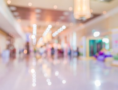 Alışveriş merkezinin bulanık görüntüsü ve arka plan kullanımı için insanlar.