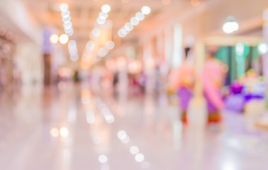 Alışveriş merkezinin bulanık görüntüsü ve arka plan kullanımı için insanlar.