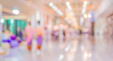 Alışveriş merkezinin bulanık görüntüsü ve arka plan kullanımı için insanlar.