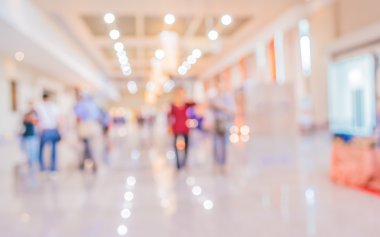 Alışveriş merkezinin bulanık görüntüsü ve arka plan kullanımı için insanlar.