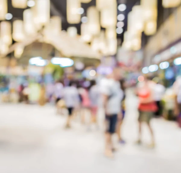 Blurred image of people walking at shopping mall — Stock Photo, Image