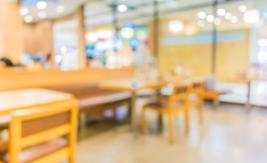 Bokeh imajı olan bir kafenin arka planı bulanık.