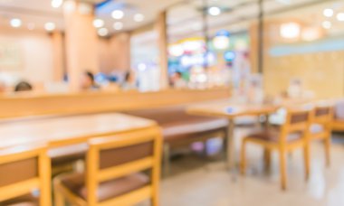 Bokeh imajı olan bir kafenin arka planı bulanık.