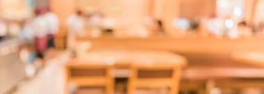 Bokeh imajı olan bir kafenin arka planı bulanık.