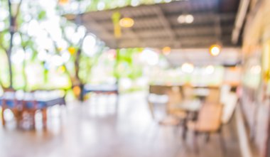 Bokeh imajı olan bir kafenin arka planı bulanık.