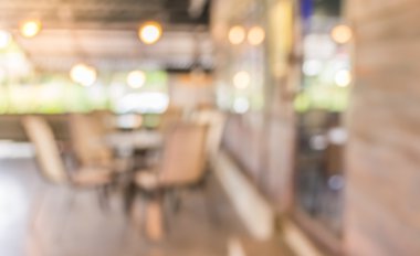 Bokeh imajı olan bir kafenin arka planı bulanık.