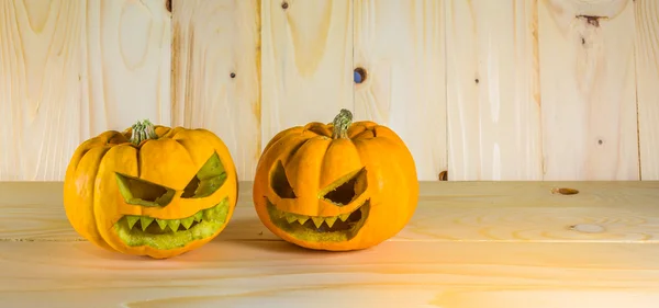 Pumpkins on wooden background — Stock Photo, Image