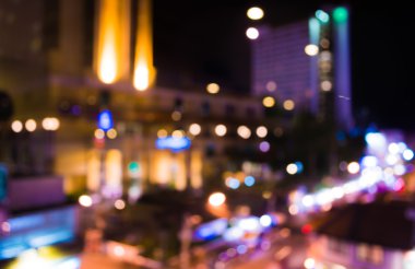 Sıcak renkli gece ışıklarıyla bulanık bokeh arkaplan görüntüsü .