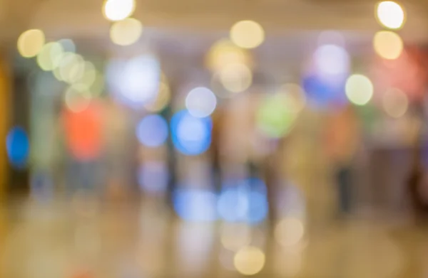 Blur image of Long empty corridor on night time with bokeh. — Stock Photo, Image