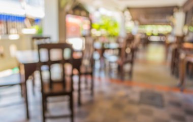 Arka plan kullanımı için gündüz vakti retro restoranın bulanık görüntüsü.
