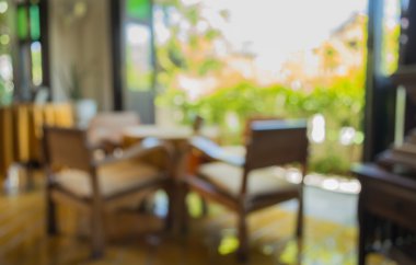 Arka plan kullanımı için gündüz vakti retro restoranın bulanık görüntüsü.
