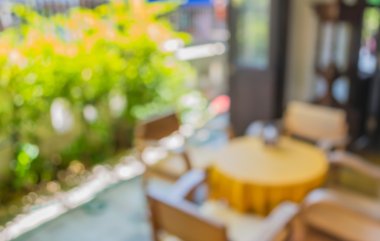 Arka plan kullanımı için gündüz vakti retro restoranın bulanık görüntüsü.