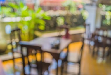 Arka plan kullanımı için gündüz vakti retro restoranın bulanık görüntüsü.