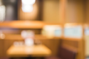 Bokeh imajı olan bir kafenin arka planı bulanık .