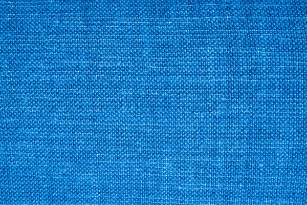 Linen dense fabric pattern of blue color for curtains design or internal wall decoration of a modern building with vibrant shiny material. — Stock Photo, Image