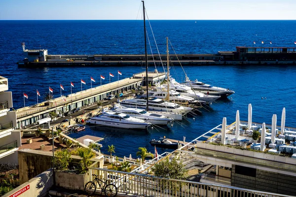 Monte Carlo, Monaco 29.11.2020 Sailing boats yachts and modern vessels in port on seascape background — Stock Photo, Image